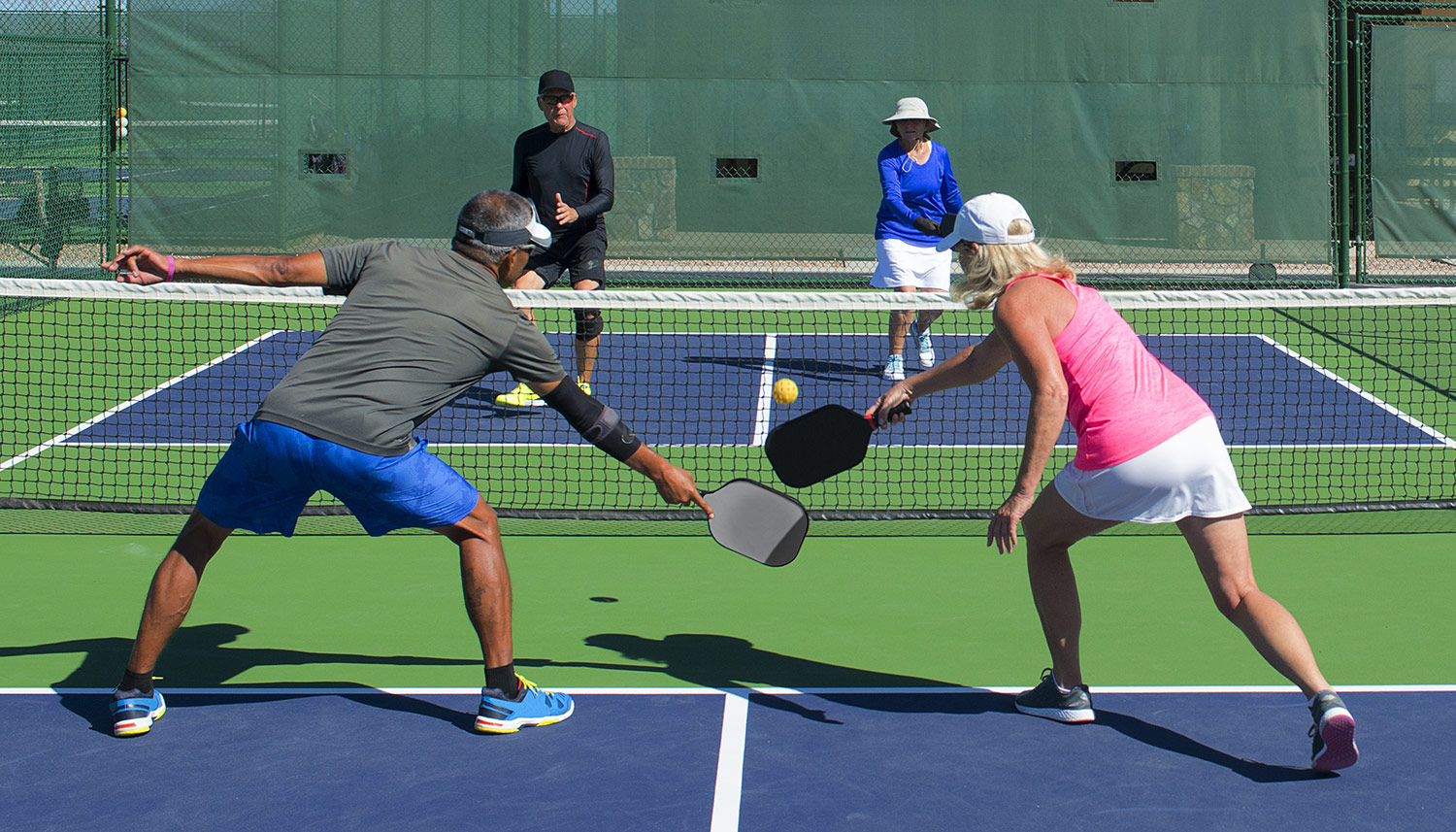 pickleball playing in court